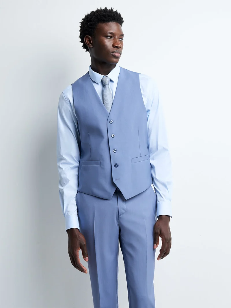 Gilet coordonnable en laine uni