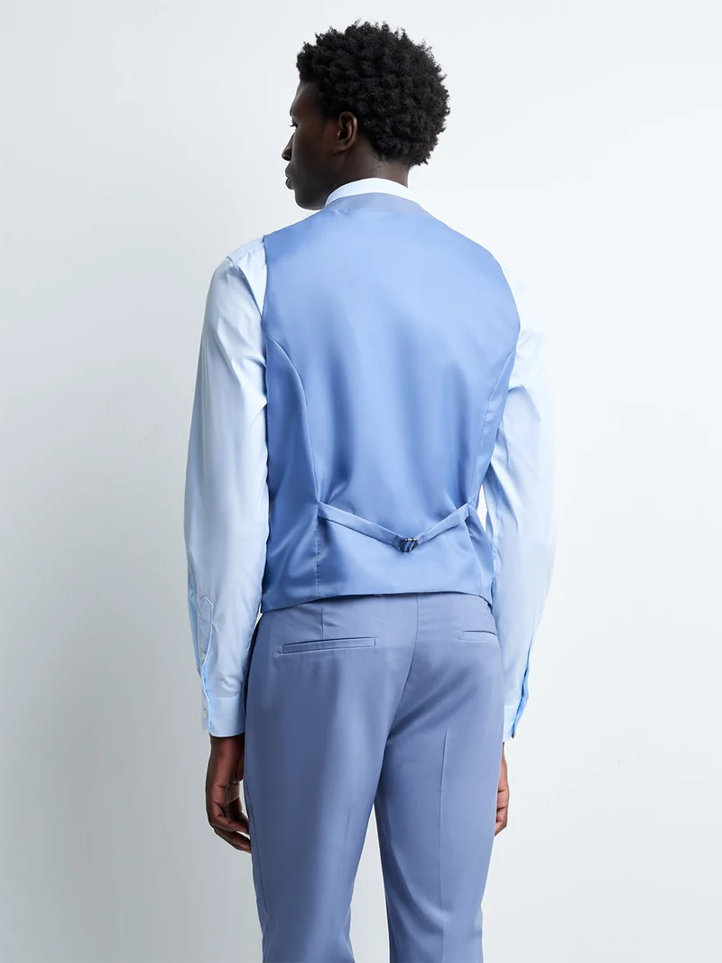 Gilet coordonnable en laine uni
