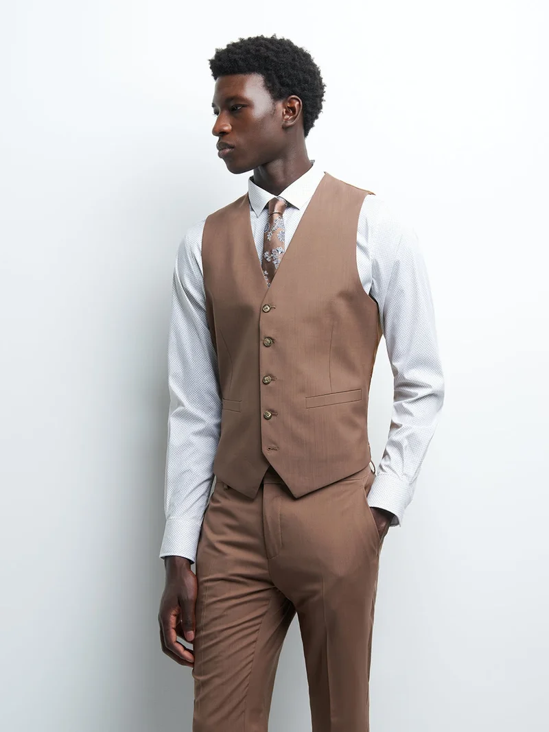 Gilet coordonnable en laine uni