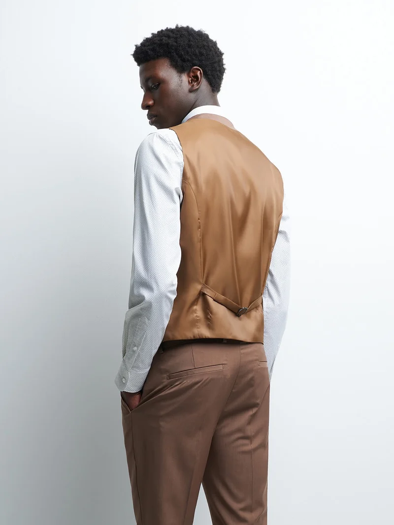 Gilet coordonnable en laine uni