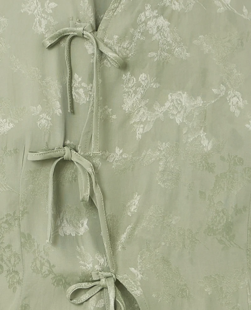 Top dos-nu en tissu satiné avec col mao et fleurs
