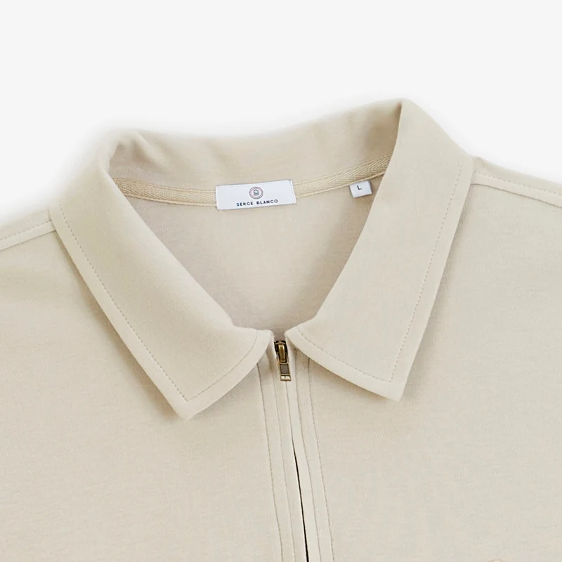 Polo zippé manches longues en coton interlock beige
