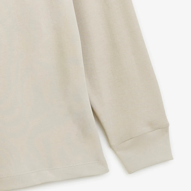 Polo zippé manches longues en coton interlock beige