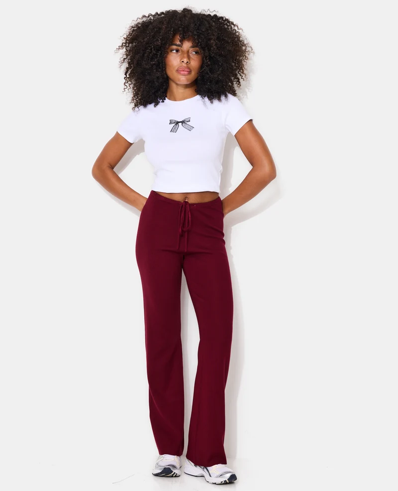 Pantalon en maille avec lien coulissé