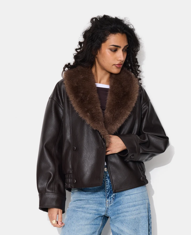 Blouson en simili grand col fausse fourrure