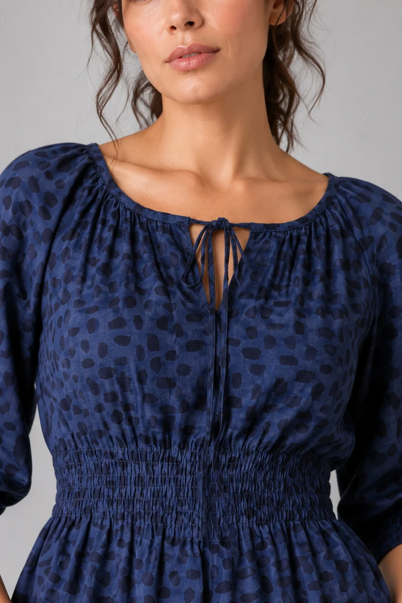 Avelin|Viscose Smocked Waist Peplum Top