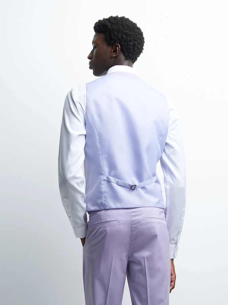 Gilet coordonnable en laine uni