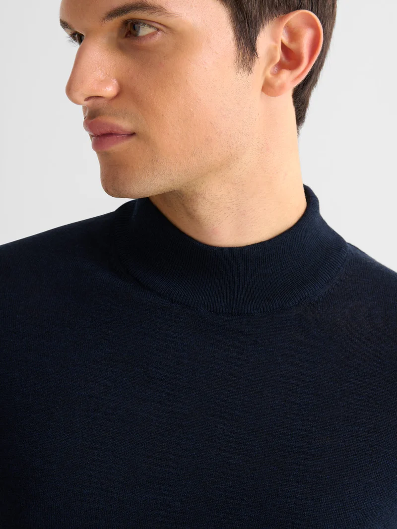 Pull col cheminée en laine Mérinos