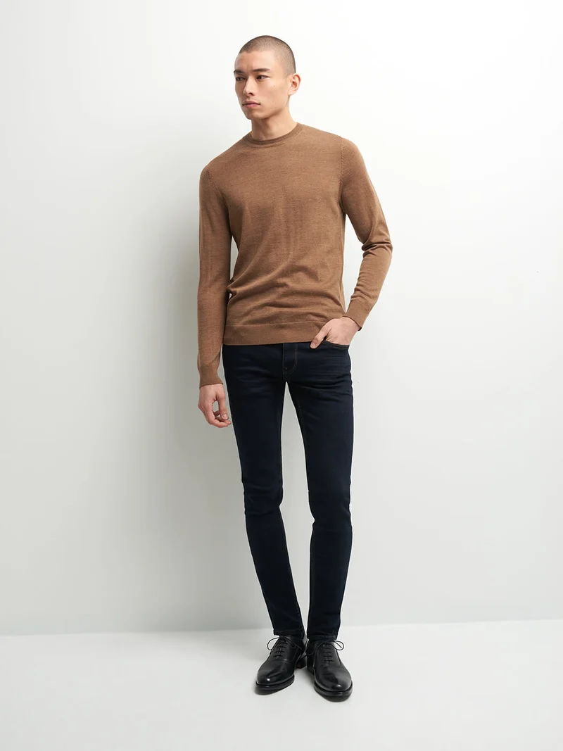Jean xslim en coton élasthane brut