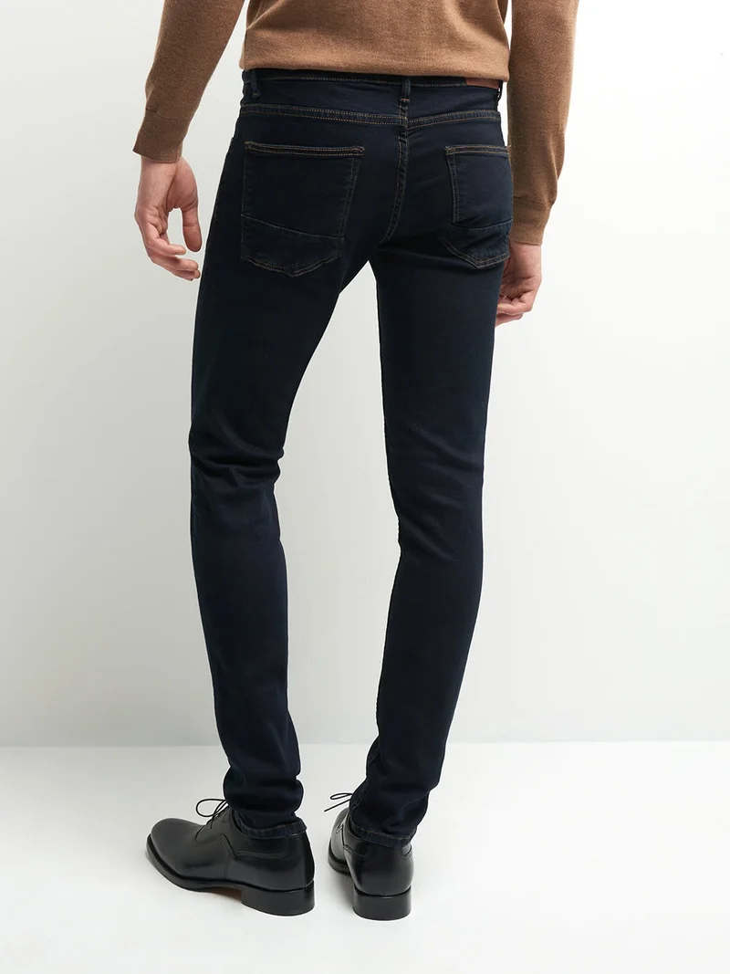 Jean xslim en coton élasthane brut