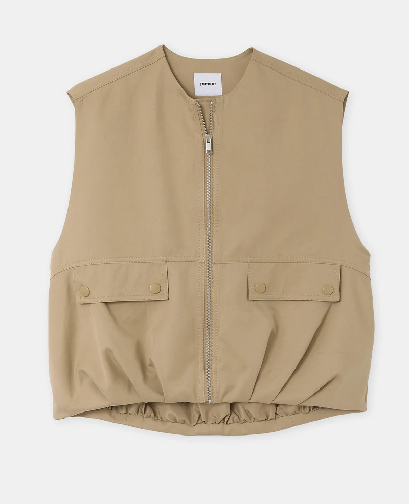 Blouson sans manches zippée avec effet bouffant