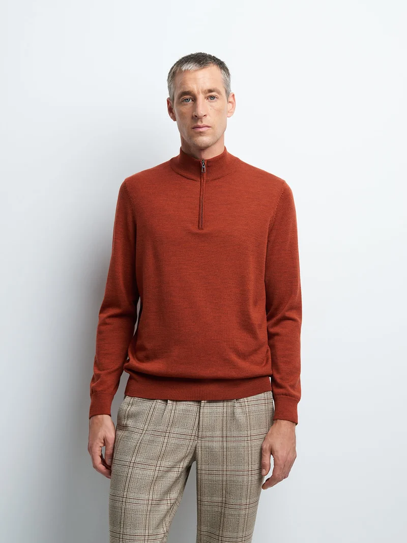 Pull col montant zippé en laine mérinos