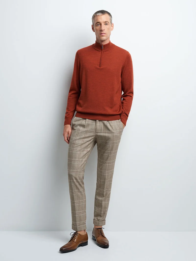 Pull col montant zippé en laine mérinos