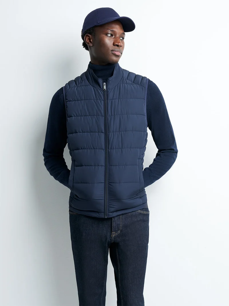 Gilet sans manche à col montant
