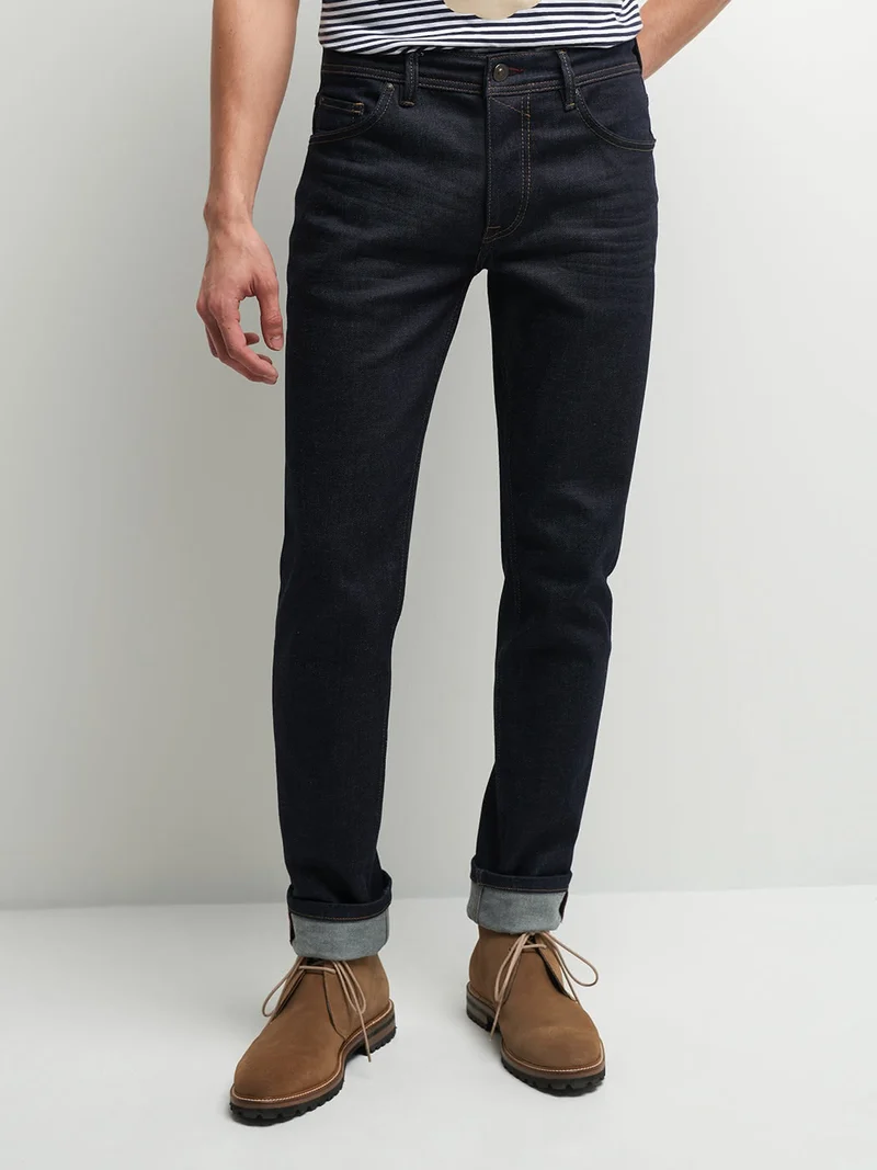 Jean regular en coton élasthane brut