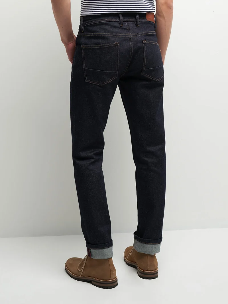 Jean regular en coton élasthane brut