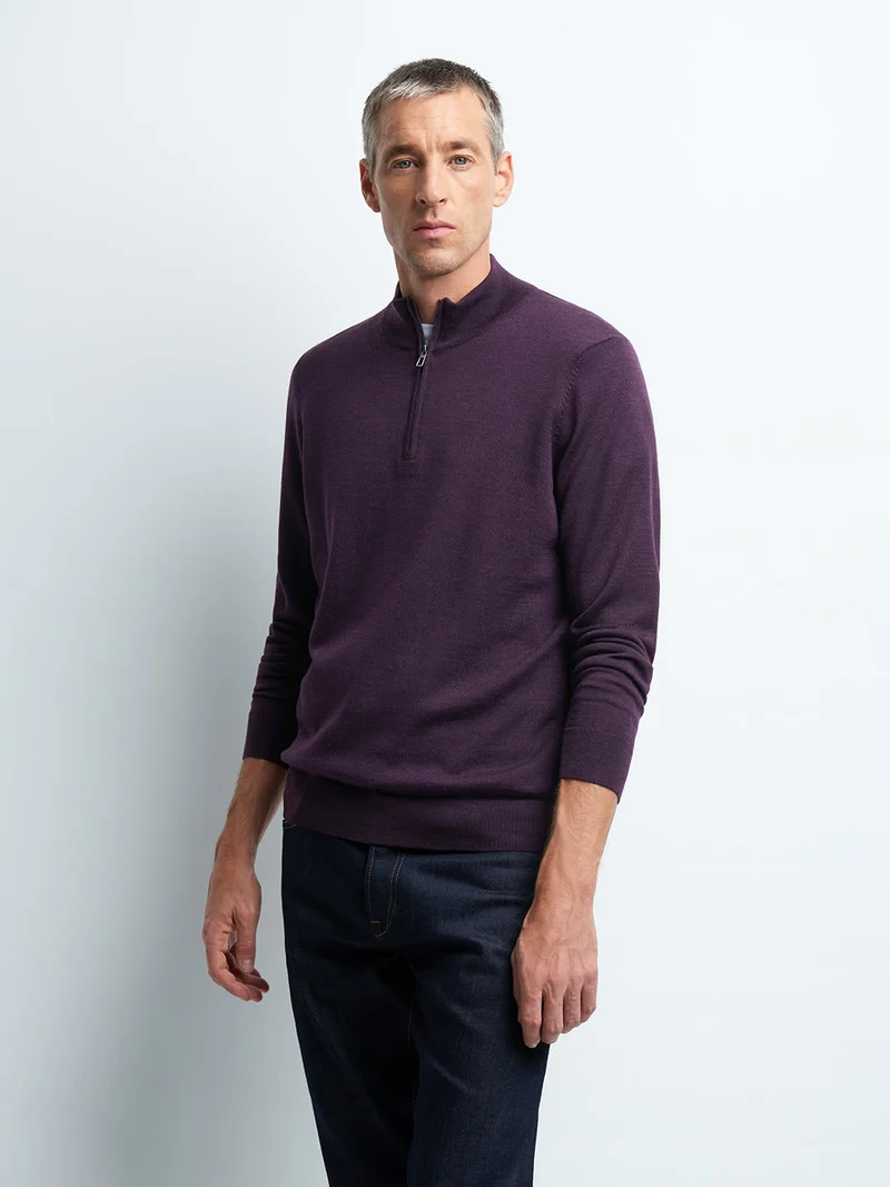Pull col montant zippé en laine mérinos