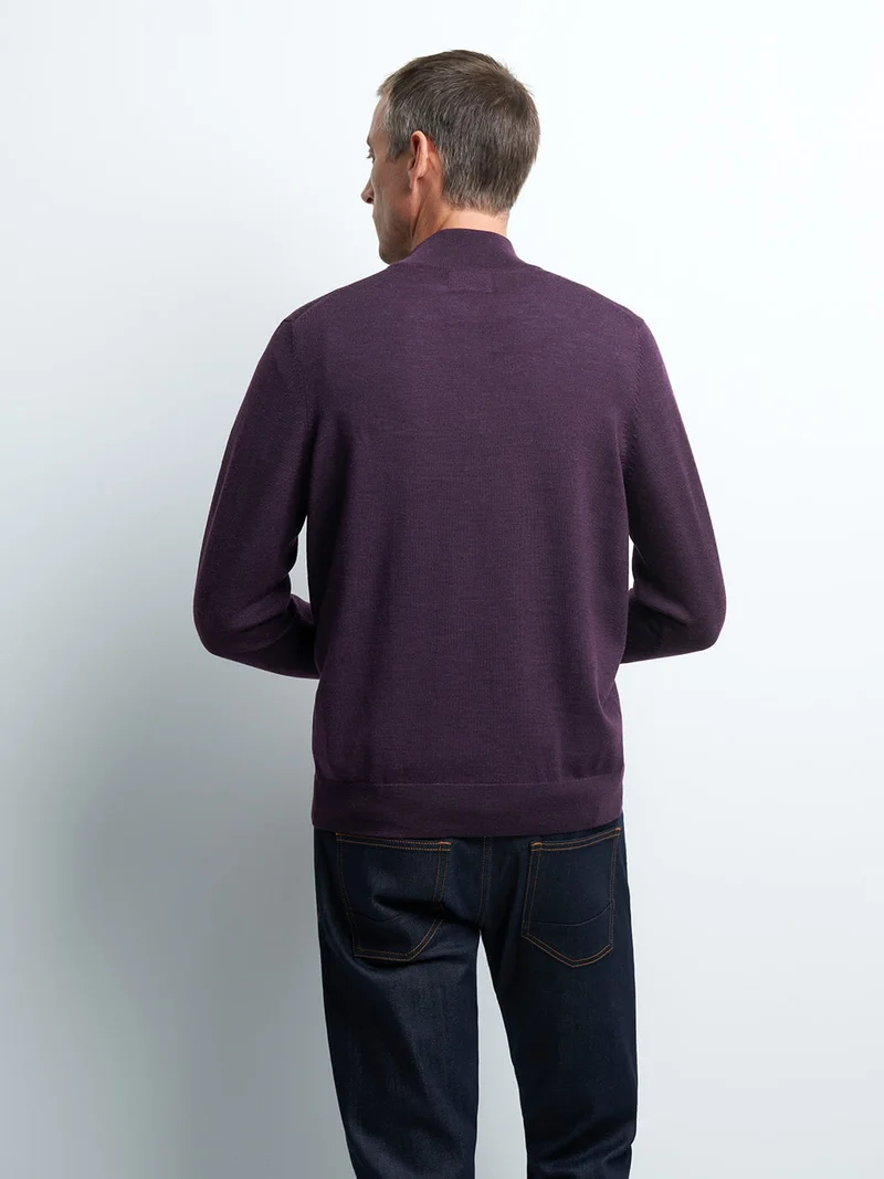 Pull col montant zippé en laine mérinos