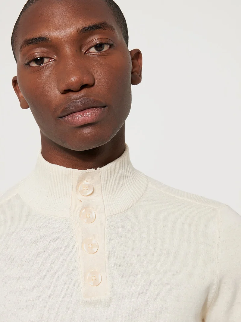 Pull col boutonné uni en coton cachemire