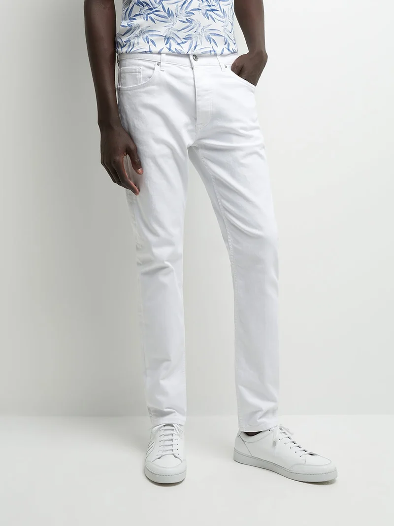 Jean couleur slim en coton élasthane uni