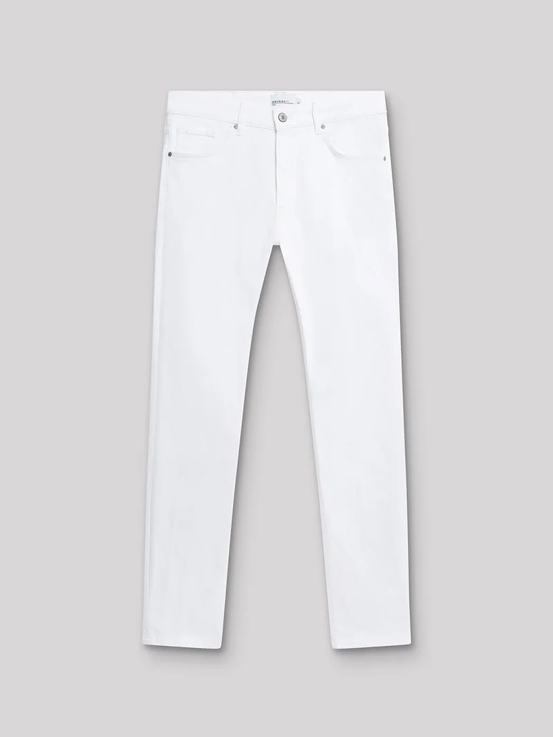 Jean couleur slim en coton élasthane uni