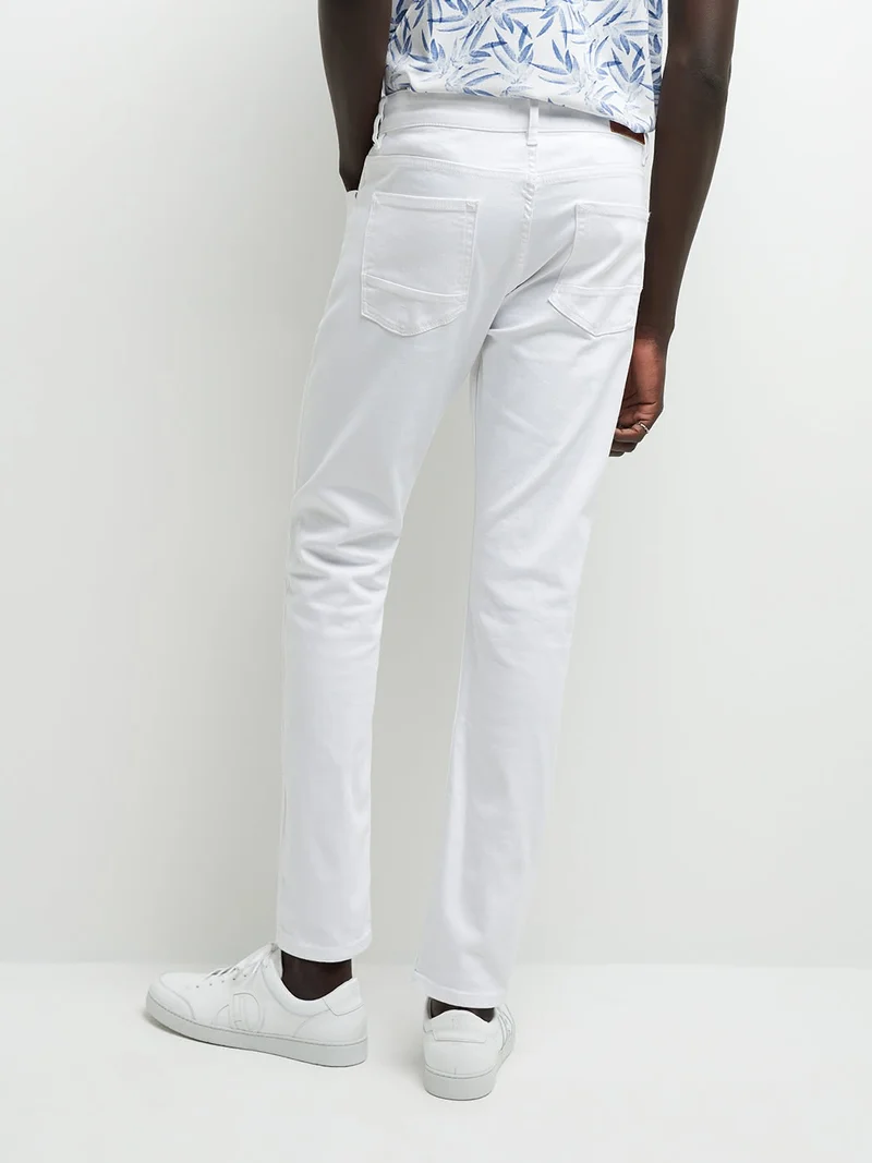 Jean couleur slim en coton élasthane uni