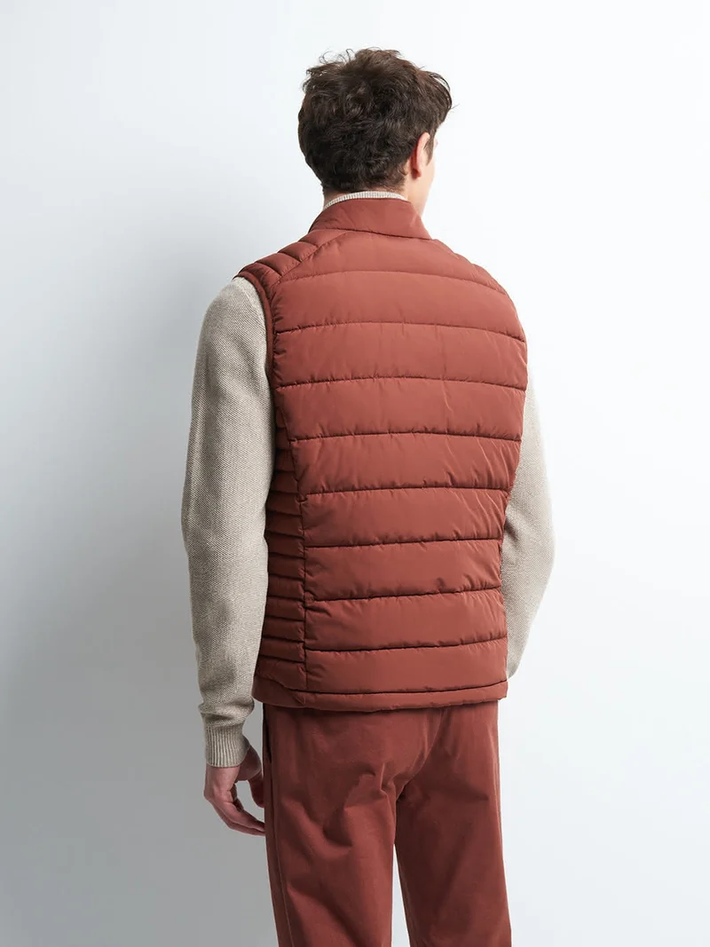 Gilet sans manche col montant