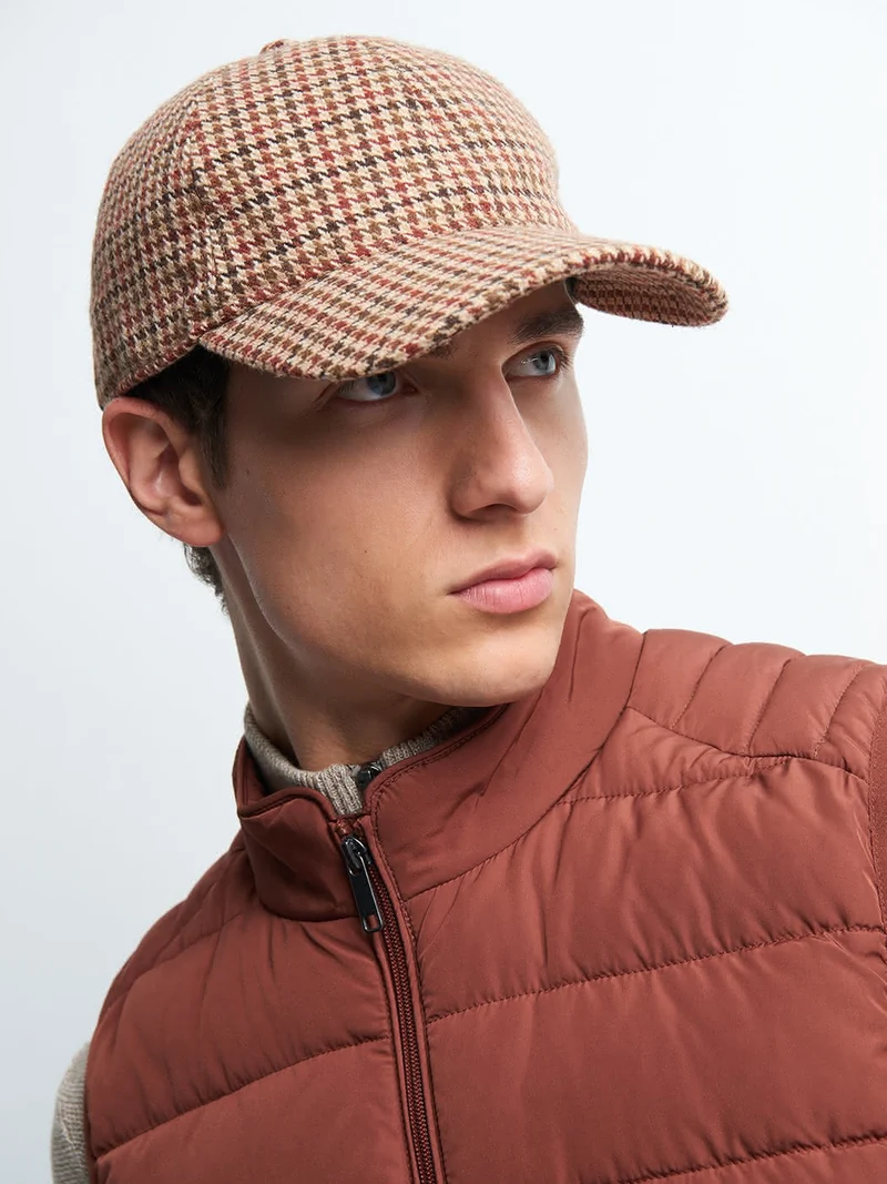 Gilet sans manche col montant