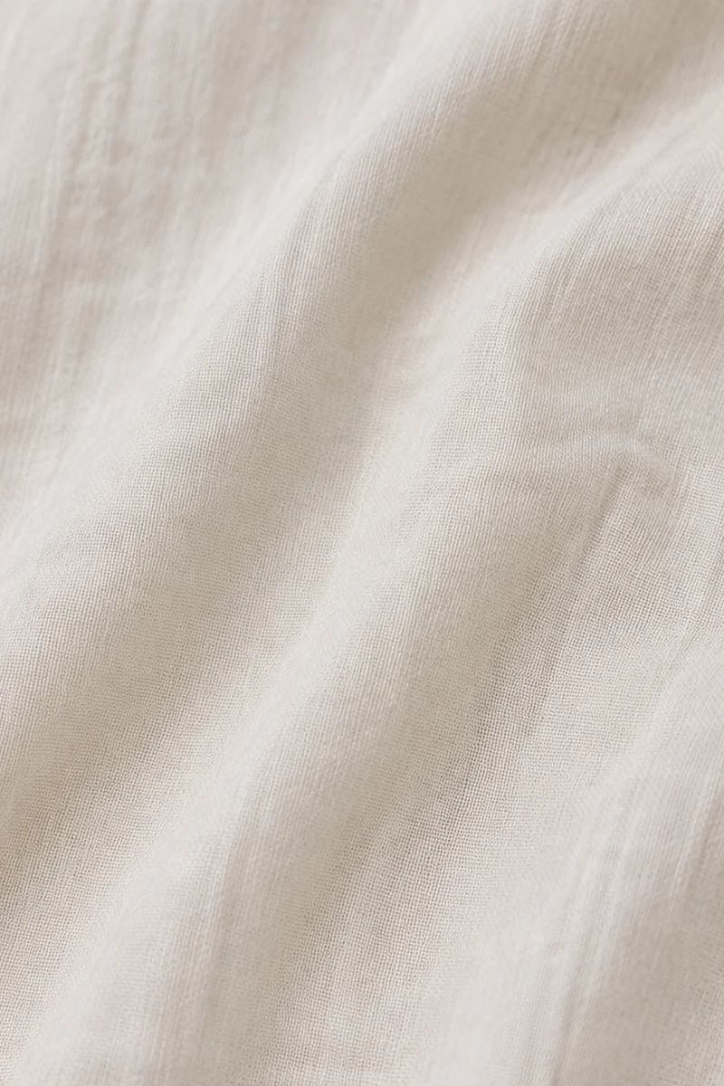 Aisla|Ivory Smocked Waist V Neck Top