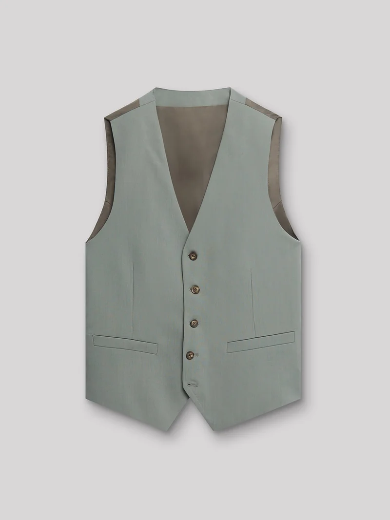 Gilet coordonnable en laine uni