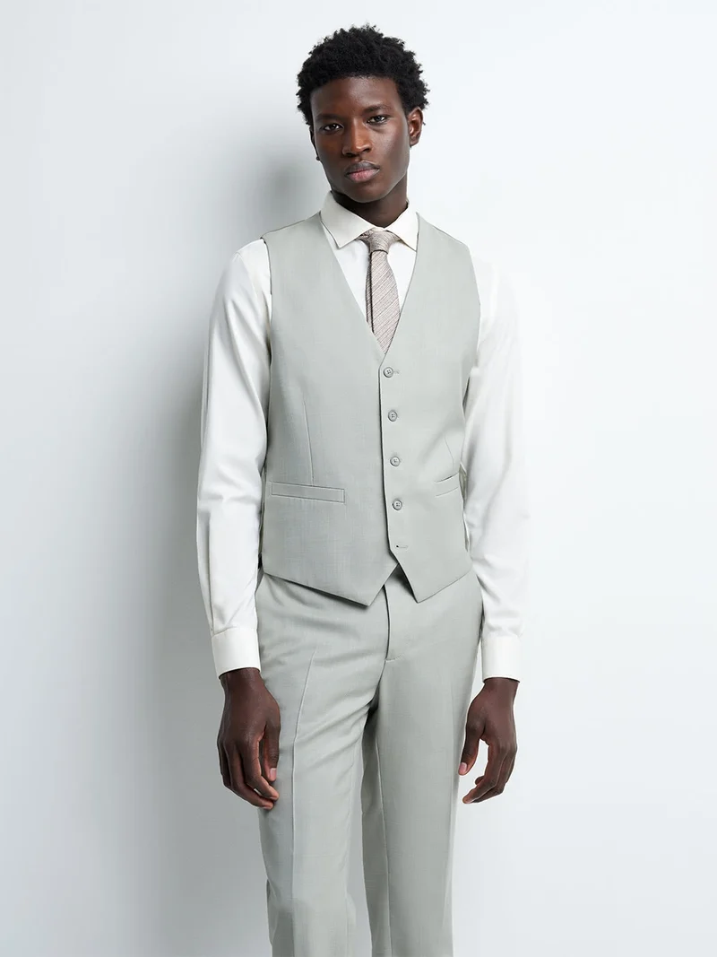 Gilet coordonnable en laine uni