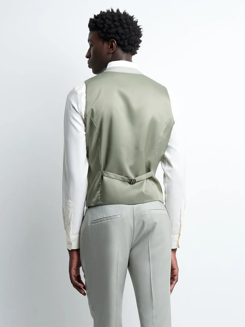 Gilet coordonnable en laine uni