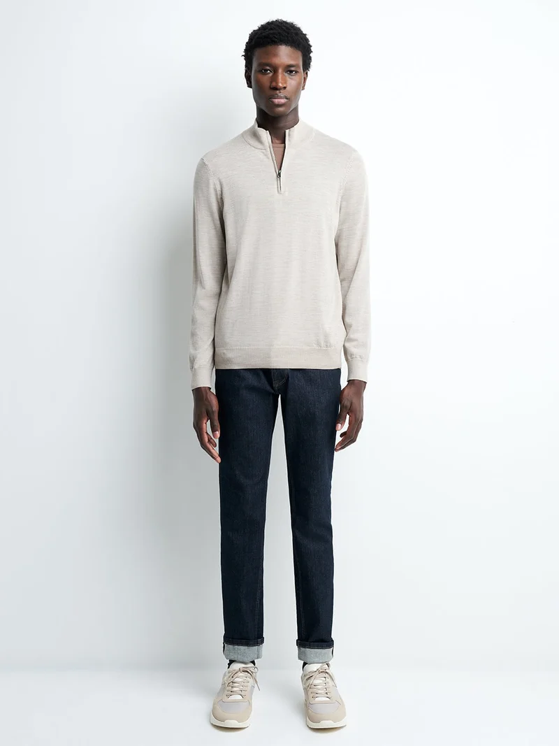 Pull col montant zippé en laine mérinos