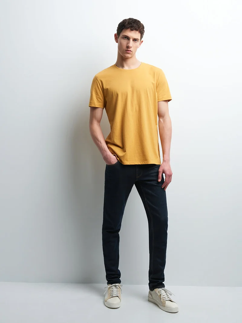 Jean slim en coton élasthane brut