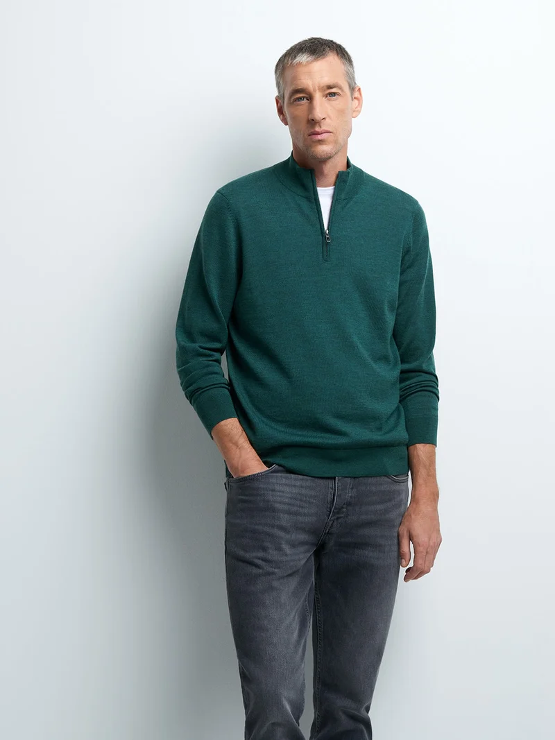 Pull col montant zippé en laine mérinos