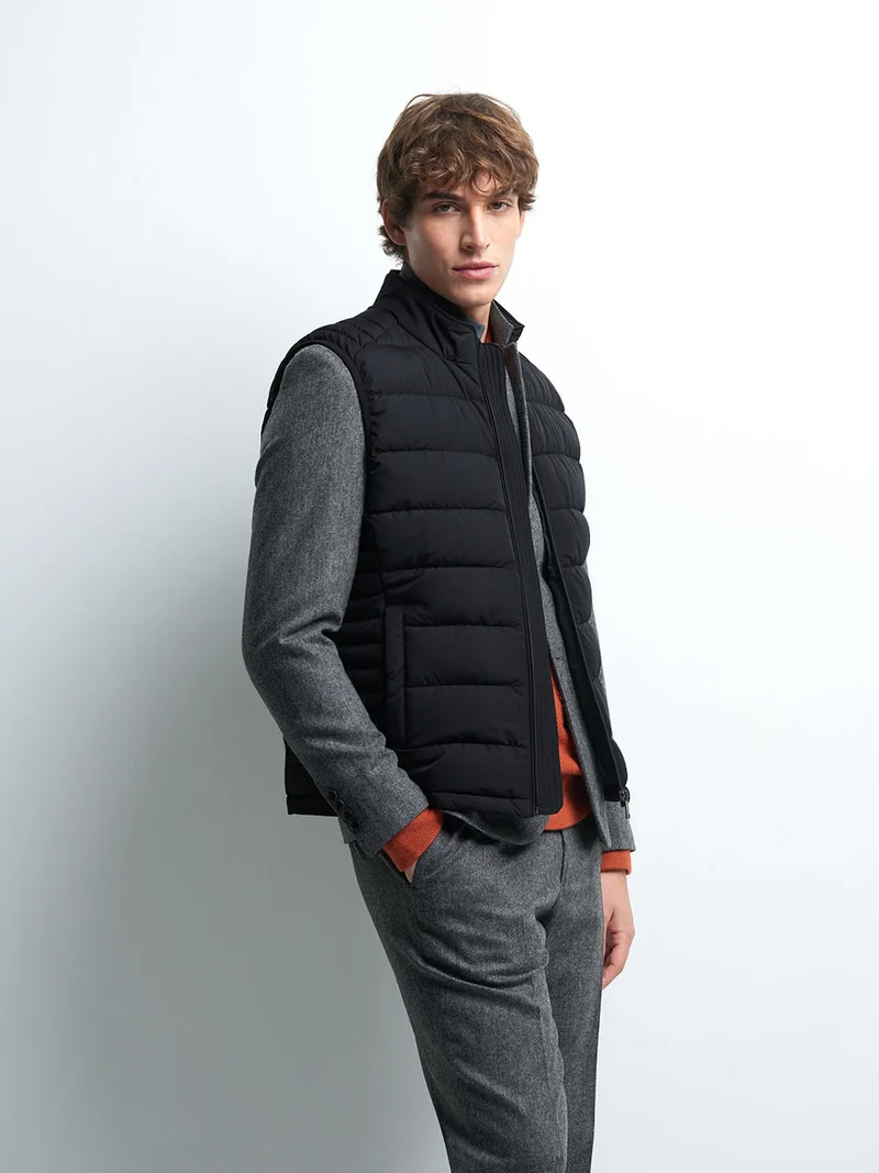 Gilet sans manche col montant