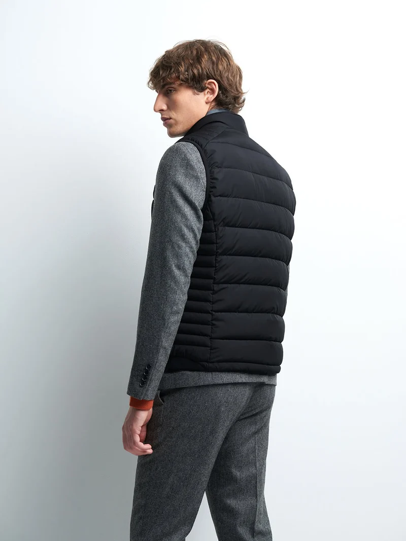 Gilet sans manche col montant