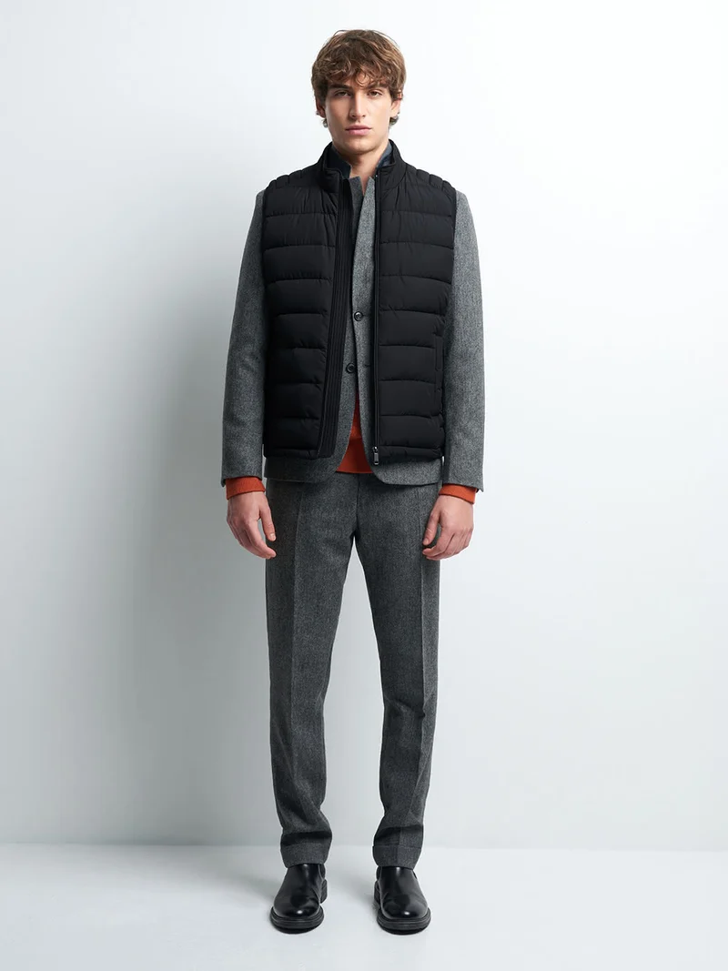 Gilet sans manche col montant