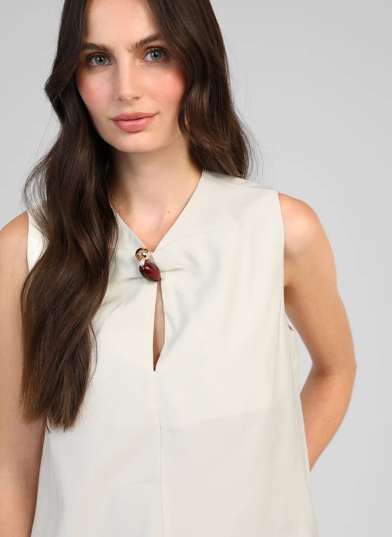TOP KEZRA blanc casse