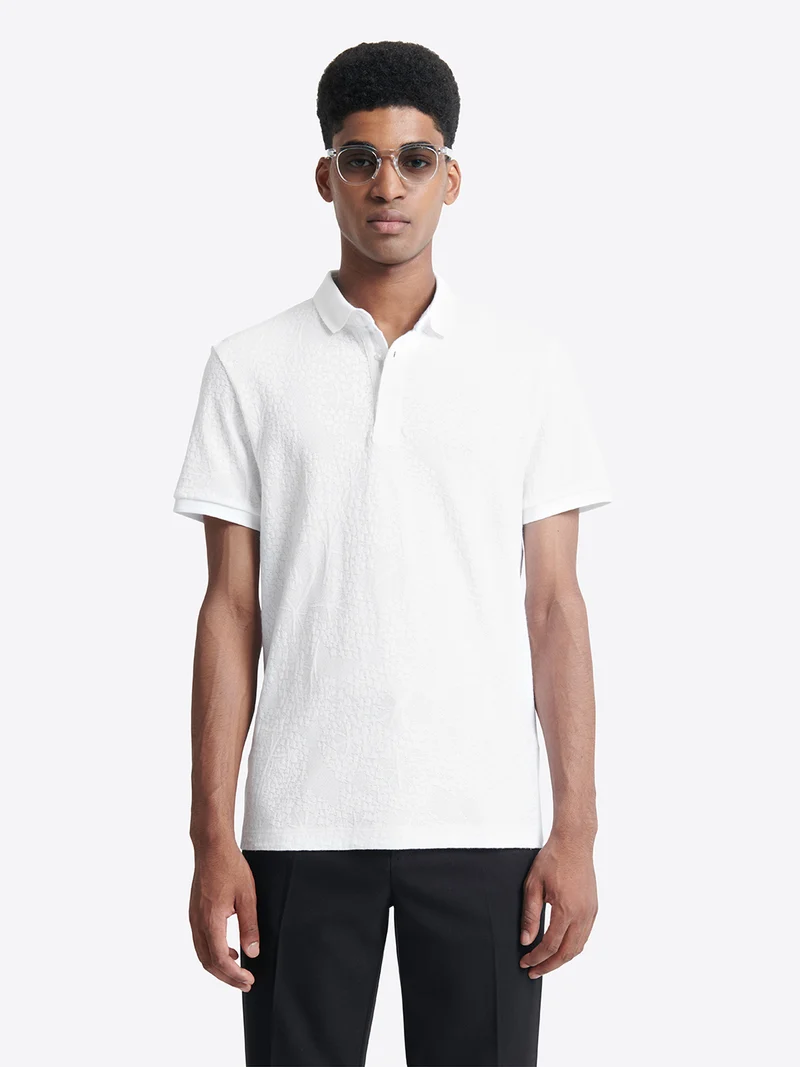 Polo manches courtes à relief 100% coton
