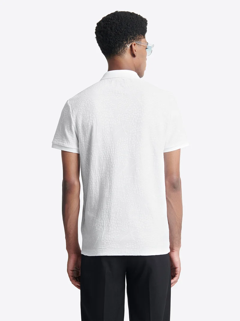 Polo manches courtes à relief 100% coton