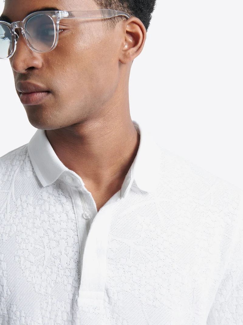 Polo manches courtes à relief 100% coton