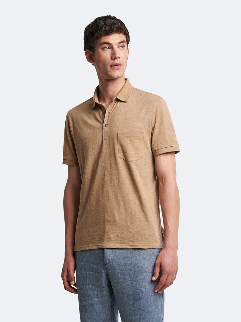 Polo manches courtes en coton faux-uni