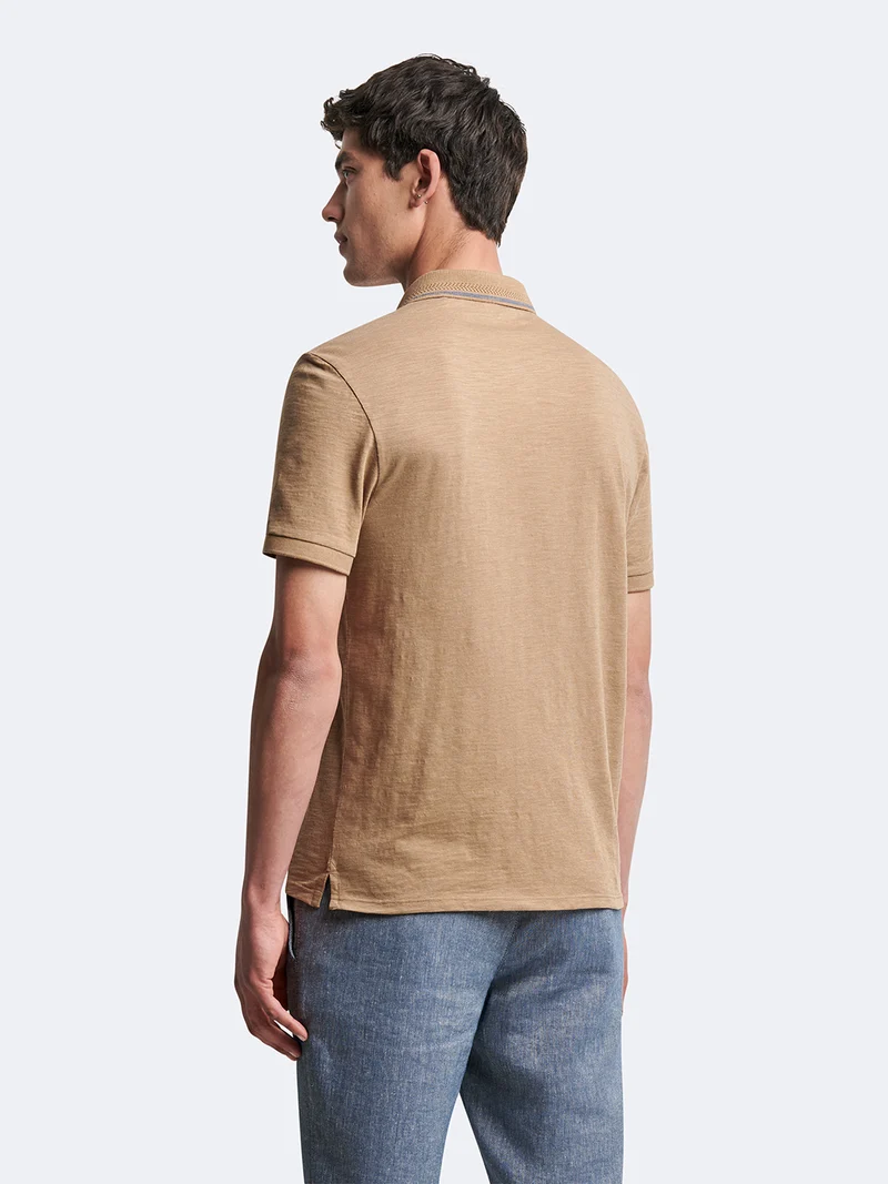 Polo manches courtes en coton faux-uni