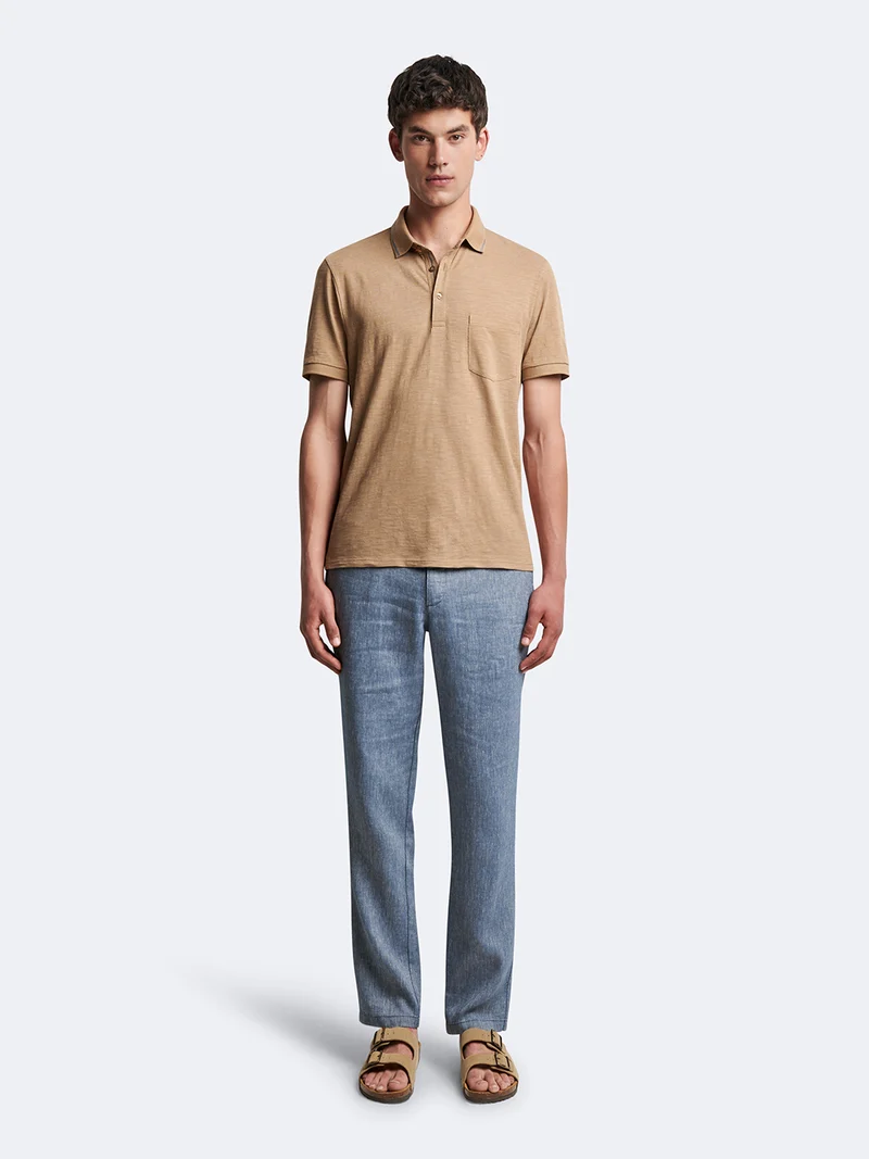 Polo manches courtes en coton faux-uni