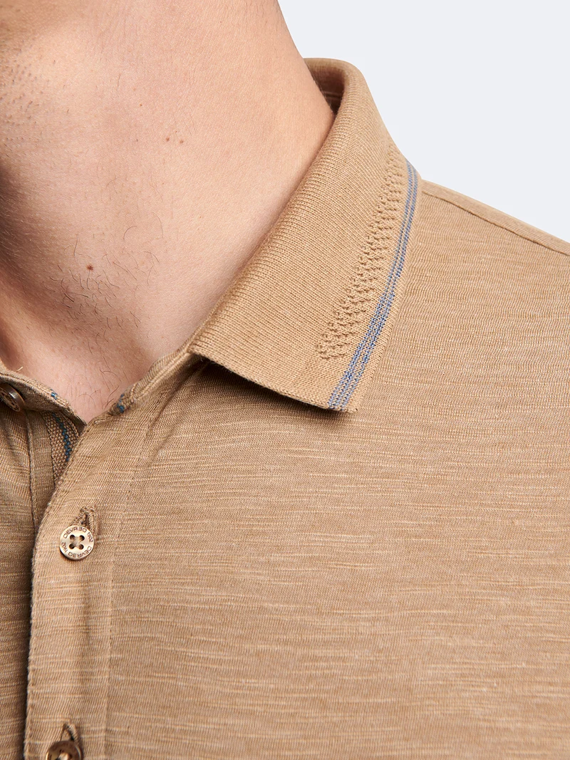 Polo manches courtes en coton faux-uni