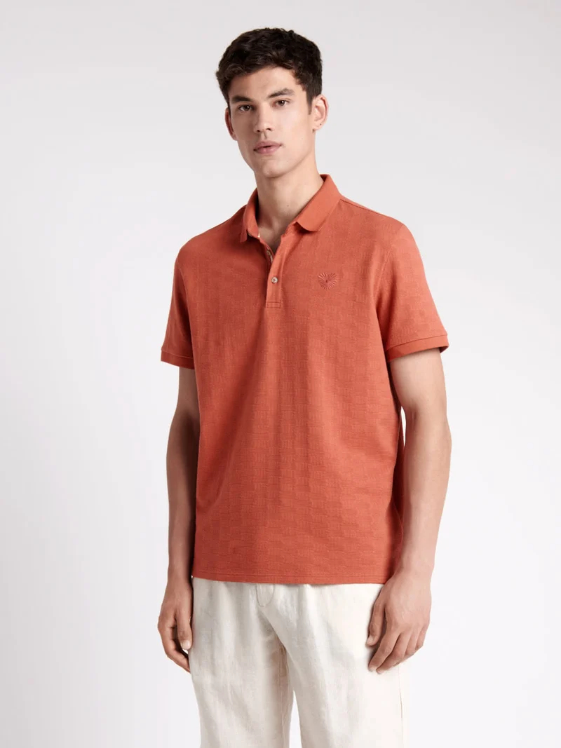 Polo manches courtes en coton à relief