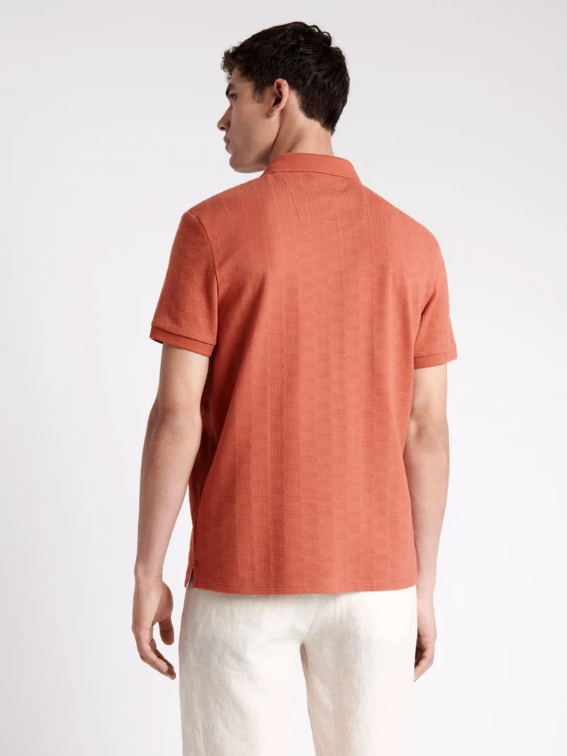 Polo manches courtes en coton à relief