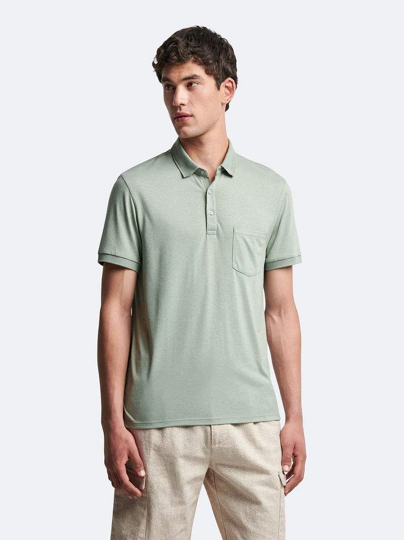 Polo manches courtes en viscose faux-uni