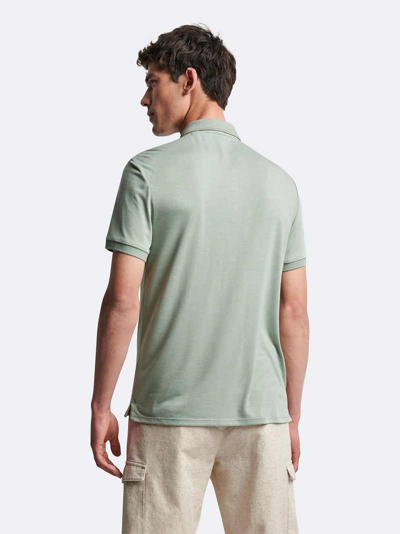 Polo manches courtes en viscose faux-uni